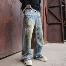 Load image into Gallery viewer, Street Graffiti Ripped Jeans Men And Women Loose Straight Neutral